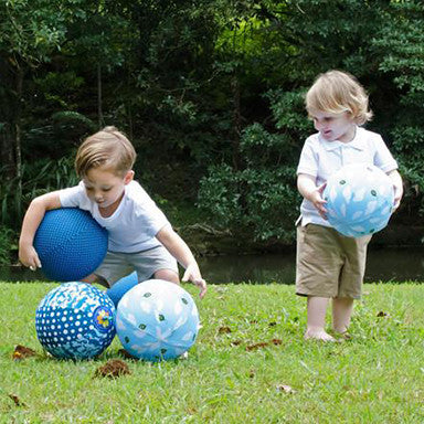 Boys playing with Balloon Ball Clouds and Blue Sky Blueberry Rainbows & Clover The Hera Collective