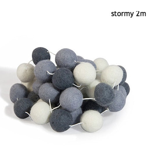 felt garland of round balls, colour stormy, shades of white, pale grey, grey, dark grey